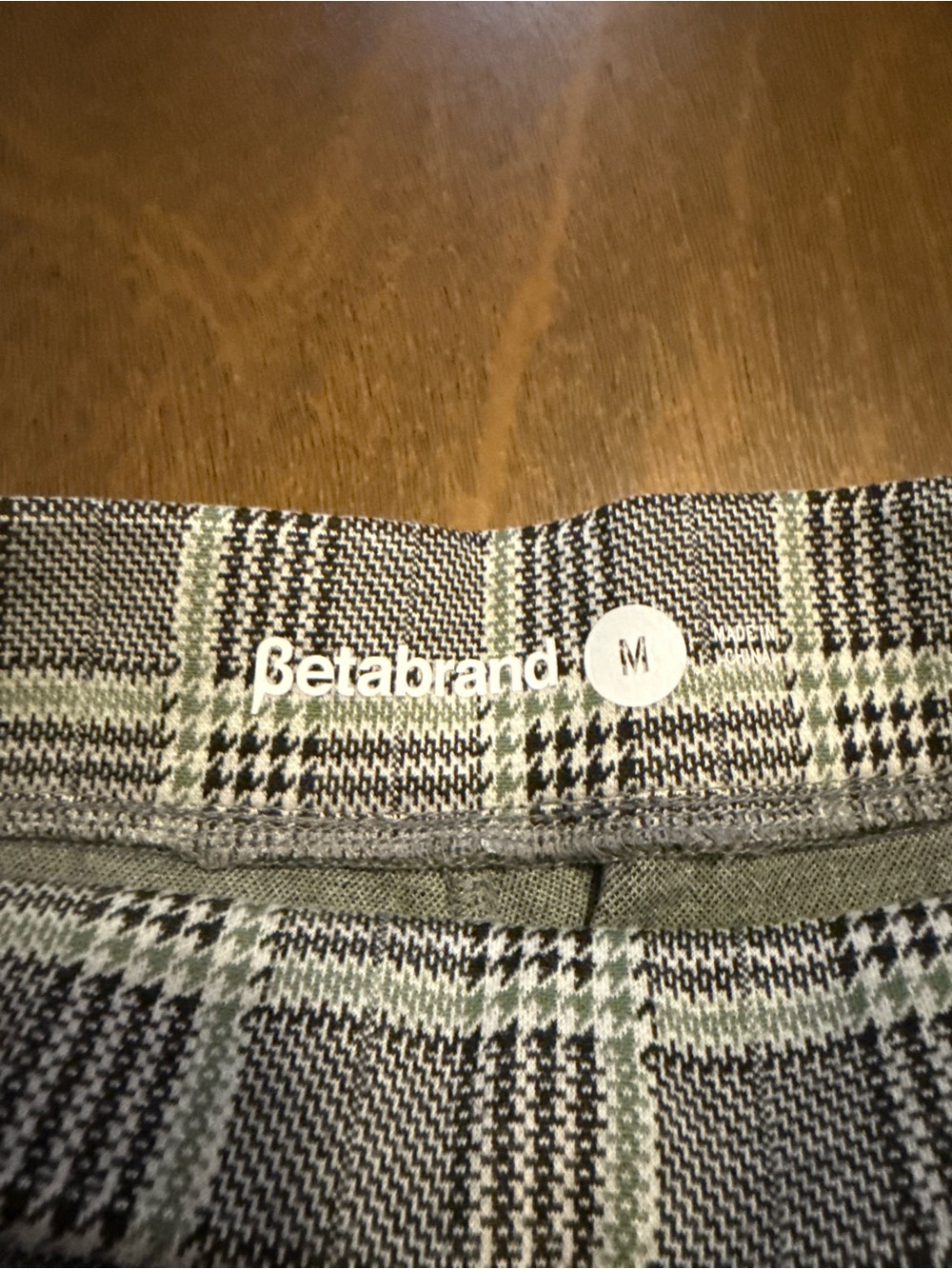 Betabrand Black, Gray & Green Plaid Knit wide leg pants.